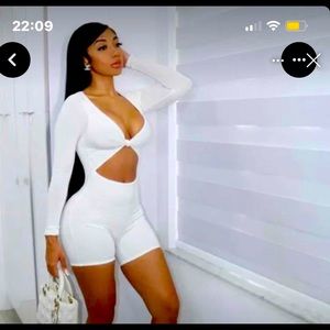 New white romper size Medium